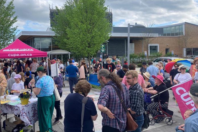 In its first initiative as a grassroots organization, Our Future Peterborough joined the May 15, 2025 rally outside the Peterborough Public Library to protest the facility's recently publicized restructuring and staffing cuts. The cuts will see three librarians, including the children's librarian, laid off to save $120,000 from the city's annual budget. (Photo courtesy of Our Future Peterborough)