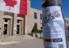 One of Our Future Peterborough's flyers taped to a light pole in front of Peterborough City Hall. Fighting against the restructuring and job elimination at the Peterborough Public Library is the "spark" that encouraged three Peterborough parents to form the grassroots organization committed to protecting the city's public services for children and families. (Photo courtesy of Our Future Peterborough)