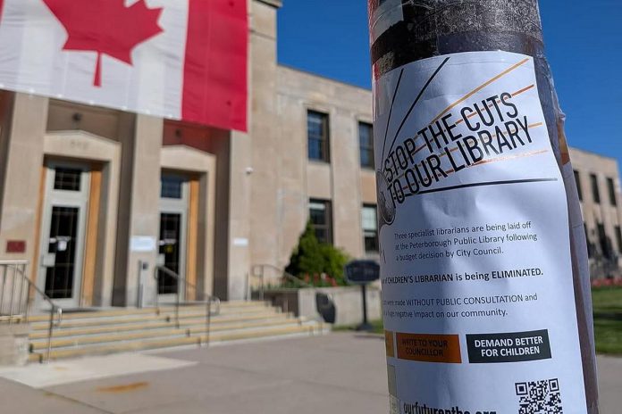 One of Our Future Peterborough's flyers taped to a light pole in front of Peterborough City Hall. Fighting against the restructuring and job elimination at the Peterborough Public Library is the "spark" that encouraged three Peterborough parents to form the grassroots organization committed to protecting the city's public services for children and families. (Photo courtesy of Our Future Peterborough)