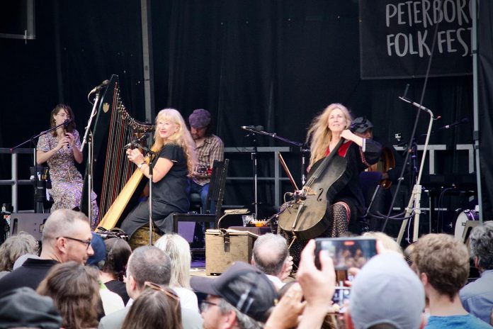 Loreena McKennitt headlining during the 2023 Peterborough Folk Fest at Peterborough's Nicholls Oval Park. As a community festival, the volunteer board of directors listens to feedback from audiences, gathering suggestions for the artists they would like to see on stage. (Photo courtesy of Peterborough Folk Festival)