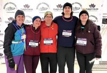 Peterborough Regional Health Centre emergency physician Dr. Terry May (centre) and his wife Chris Ferguson (far left) and their children participating in a five-kilometre run in December 2024. (Photo courtesy of the May Family)