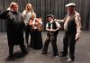 Trent Valley Archives Theatre's play "Crossing Over" is a fictionalized account of the cross-Atlantic journey of the John Barry, one of the nine emigrant transport ships that brough over 2,000 Irish settlers to the Peterborough region 200 years ago. In this scene from a play rehearsal, John Keleher (Hugh Foley, right) brings petty thief Tim Ryan (Kaza Hesselink, second from right) to the ship's surgeon and superintendent William Burnie (Ashley Parker, left) for shipboard justice as Mr. and Mrs. Hagarty (Lucas Pronk and Cathy Brand) look on with worry, as they have secrets of their own to keep. (Photo courtesy of Trent Valley Archives Theatre)