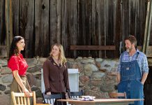 Actors Julia Scaringi, Kiana Bromley, and Jay Davis perform a scene from "The Housekeeper" at a media day hosted by 4th Line Theatre on June 18, 2025 at the Winslow Farm in Millbrook. The fourth in a series about the Barnardo children written by Robert Winslow and Ian McLachlan, the play runs for 14 performances from July 1 to 19. (Photo: Jordan Lyall Photography for kawarthaNOW)