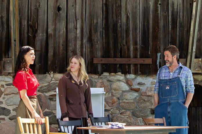 Actors Julia Scaringi, Kiana Bromley, and Jay Davis perform a scene from "The Housekeeper" at a media day hosted by 4th Line Theatre on June 18, 2025 at the Winslow Farm in Millbrook. The fourth in a series about the Barnardo children written by Robert Winslow and Ian McLachlan, the play runs for 14 performances from July 1 to 19. (Photo: Jordan Lyall Photography for kawarthaNOW) Actors Julia Scaringi, Kiana Bromley, and Jay Davis perform a scene from "The Housekeeper" at a media day hosted by 4th Line Theatre on June 18, 2025 at the Winslow Farm in Millbrook. The fourth in a series about the Barnardo children written by Robert Winslow and Ian McLachlan, the play runs for 14 performances from July 1 to 19. (Photo: Jordan Lyall Photography for kawarthaNOW)