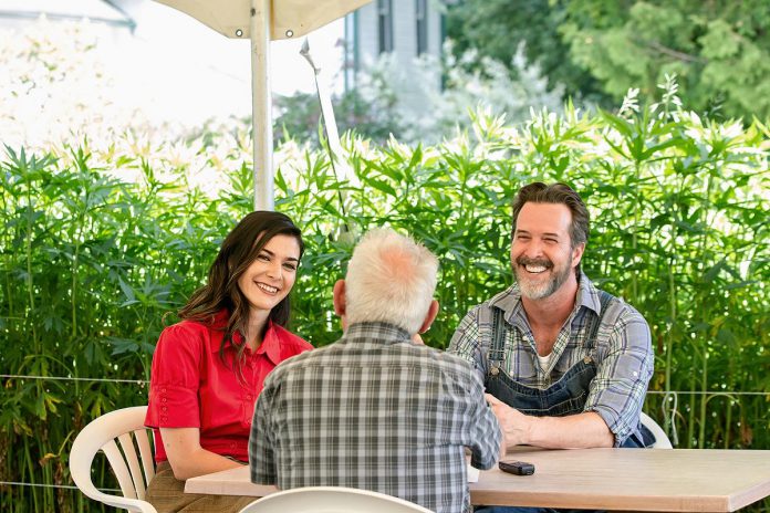 kawarthaNOW's Paul Rellinger speaks with actors Julia Scaringi and and Jay Davis, who play Eleanor Gwyn and Walter White in "The Housekeeper" by Robert Winslow and Ian McLachlan, at a media day hosted by 4th Line Theatre on June 18, 2025 at the Winslow Farm in Millbrook. The play runs for 14 performances from July 1 to 19. (Photo: Jordan Lyall Photography for kawarthaNOW)