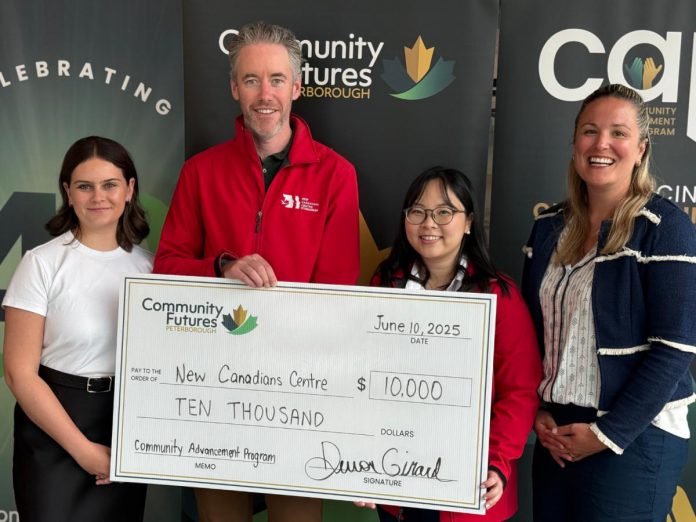 New Canadians Centre in Peterborough will use its $10,000 grant from Community Futures Peterborough's 2025 Community Advancement Program to help participating local businesses attract and retain immigrant talent while fostering positive workplace experiences for newcomers. Pictured are Abigail Keenan (left) and Devon Girard (right) of Community Futures Peterborough and Andy Cragg and Michelle Nguyen of the New Canadians Centre. (Photo: Community Futures Peterborough)