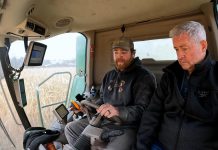 Chris Brackenridge of Squirrel Creek Farm teaches Millbrook resident David McNab about farming for a video about the farmers' way of life and the challenges they face. What began with a kind gesture from the Brackenridge family to visiting farmers from the Galapagos Islands led to McNab filming four seasons' worth of footage on the farm. The footage was recently sold to the Ontario Federation of Agriculture for enough money to support six years of school for the 12-year-old son of a female farmer in Kenya that McNab has been sponsoring. (kawarthaNOW screenshot of David McNab video)