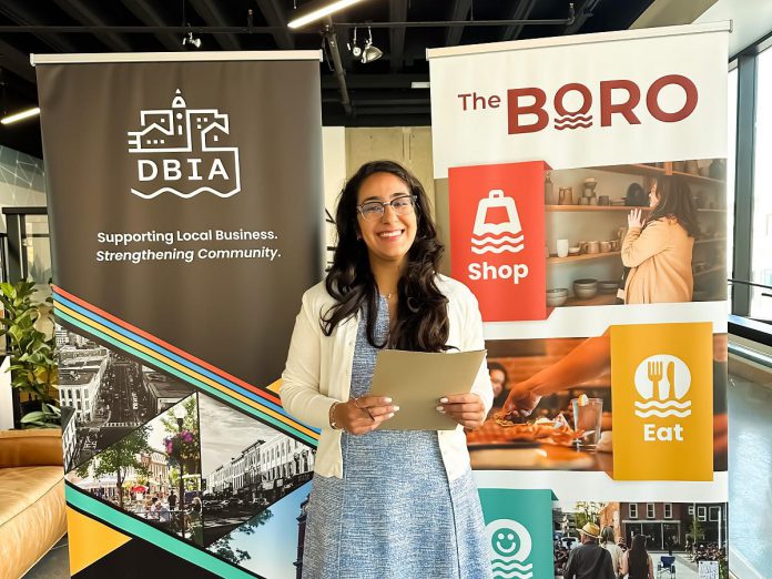Peterborough Downtown Business Improvement Area (DBIA) executive director Nour Mazloum announces the DBIA's redeveloped website TheBoro.ca at Venture North in downtown Peterborough on June 23, 2025. (Photo courtesy of Peterborough DBIA)