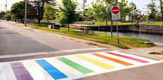 The first-ever Pride-coloured crosswalk in Fenelon Falls has been installed at the intersection of May and Water streets, an initiative of the City of Kawartha Lakes, the Fenelon Falls & District Chamber of Commerce, community residents, and local businesses and organizations. (Photo: Julia Taylor / Facebook)