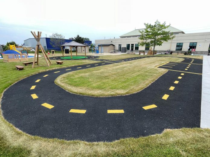 A three-year effort to transform a vacant parcel of land behind Five Counties Children's Centre in Cobourg into an accessible backyard space has been completed. The result is a space that allows for treatment, recreation, cultural awareness, and outdoor education for kids of all ages and abilities. The backyard space is already proving a hit with children, parents, families, and service providers. (Photo courtesy of Five Counties Children's Centre)