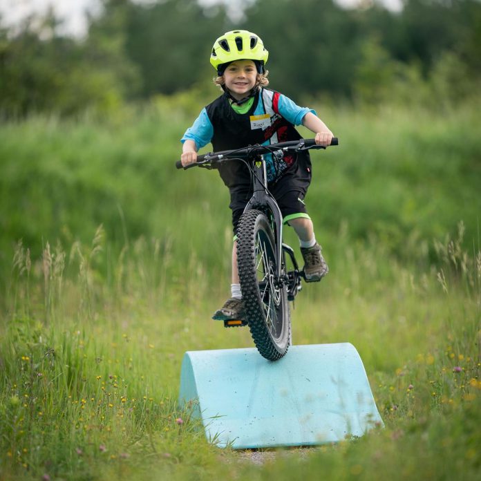 The Peterborough Cycling Club's Dirt Squad Program teaches youth aged six to 17 how to safely and skillfully navigate mountain-biking terrain. The program builds riding confidence, develops technical skills, and fosters a love for outdoor adventure. (Photo: Peterborough Cycling Club)