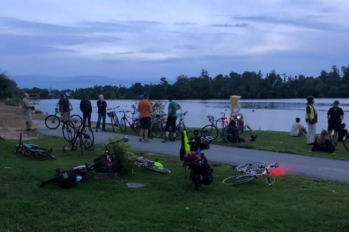 B!KE: The Peterborough Community Cycling Hub is hosting a summer solstice glow ride on June 20, 2025. After meeting at Quaker Foods City Square, participants will bike to Beavermead Beach for an hour of partying, music, games, and sparklers. Once the sun has set over the beach, cyclists will get their glow on and make a loop around downtown, finishing back at Quaker City Square. (Photo courtesy of B!KE)