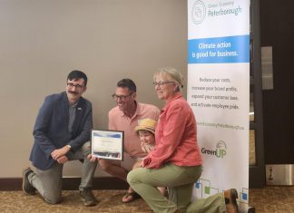 Globally, communities, countries and businesses are committing to necessary net zero emissions reduction by 2050 or sooner. At GreenUP Green Economy Peterborough's 2025 Leadership in Sustainability Awards on June 12, Engage Engineering joined Peterborough-area leaders Woodleigh Farms, Unity Design Studio, and Wild Rock Outfitters in committing to following the global lead. Many of these businesses are already carbon neutral through recent reductions and the purchasing of offsets. Pictured here is Paul Hurley of Engage Engineering, which received recognition for their recent commitment to become Net Zero. (Photo: Hayley Goodchild / GreenUP)