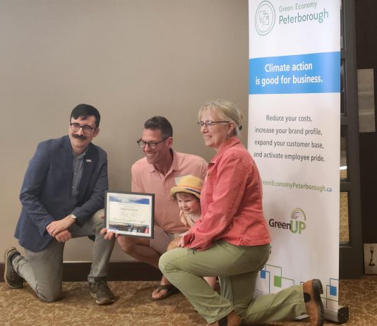 Globally, communities, countries and businesses are committing to necessary net zero emissions reduction by 2050 or sooner. At GreenUP Green Economy Peterborough's 2025 Leadership in Sustainability Awards on June 12, Engage Engineering joined Peterborough-area leaders Woodleigh Farms, Unity Design Studio, and Wild Rock Outfitters in committing to following the global lead. Many of these businesses are already carbon neutral through recent reductions and the purchasing of offsets. Pictured here is Paul Hurley of Engage Engineering, which received recognition for their recent commitment to become Net Zero. (Photo: Hayley Goodchild / GreenUP)