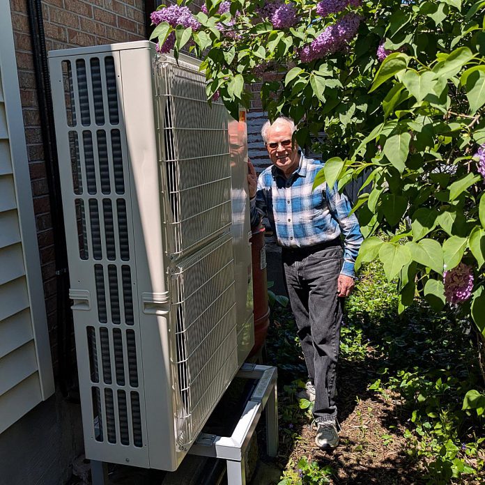 This electric heat pump provides both heating and cooling for Ray Scott's west-end home in Peterborough. His neighbour (whose home is adjacent to the heat pump) has commented on how much quieter it is than a traditional air conditioner. The Home Energy and EV Expo at the McDonnel Street Activity Centre on June 14, 2025 will feature homeowners such as Ray, who will share their experiences they've had on their electrification journeys. (Photo: Clara Blakelock / GreenUP)