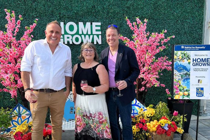 "HomeGrown: A Habitat Vineyard Party Fundraiser" on June 7, 2025 at Rolling Grape Vineyards in Bailieboro raised $24,000 for Habitat for Humanity Peterborough & Kawartha Region (Habitat PKR). Pictured is event host Neil Morton of Cormor Inc. with Habitat PKR CEO Susan Zambonin and her husband and Habitat PKR procurement manager Mario Zambonin. (Photo courtesy of Habitat PKR) "HomeGrown: A Habitat Vineyard Party Fundraiser" on June 7, 2025 at Rolling Grape Vineyards in Bailieboro raised $24,000 for Habitat for Humanity Peterborough & Kawartha Region (Habitat PKR). Pictured is event host Neil Morton of Cormor Inc. with Habitat PKR CEO Susan Zambonin and her husband and Habitat PKR procurement manager Mario Zambonin. (Photo courtesy of Habitat PKR)