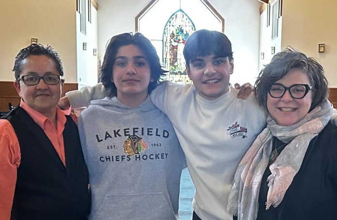 Peterborough healthcare professionals Vanita Lokonathan and Sheena Howard with their teenage sons Balan and Ashwyn. The couple encourage LGBTQ+ family members and allies to thank businesses who show signs of solidarity with the LGBTQ+ community and to talk to their children about how they can support and be a friend to children who belong to non-traditional families. (Photo courtesy of Sheena Howard and Vanita Lokanathan)