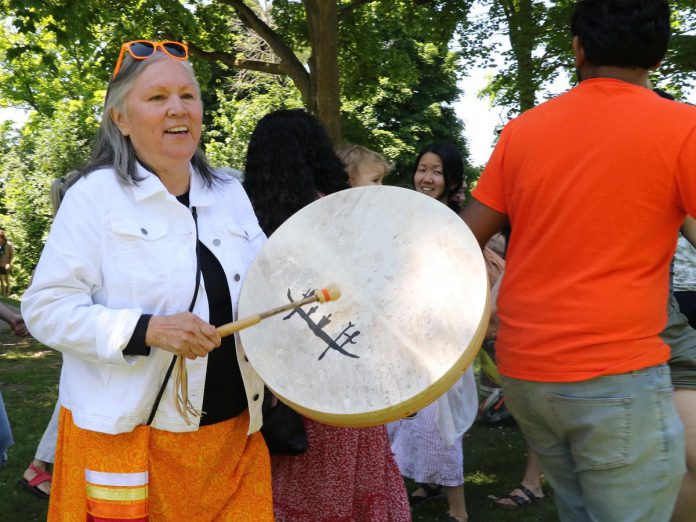 Curve Lake First Nation leader and advocate Janet McCue (pictured) and her sister Linda McCue will open the New Canadians Centre's fifth annual "Lessons from the Land" event on July 1, 2025 at the Jiimaan Kinomaagewin / Canadian Canoe Museum in Nogojiwanong-Peterborough. Janet will also give a talk on wild rice during the free event. (Photo: New Canadians Centre)