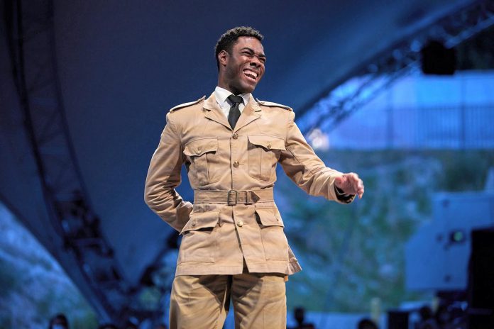 Canadian actor, playwright, and director Cameron Grant performing as Montague in the Stratford Festival's 2021 staging of "Serving Elizabeth" by Marcia Johnson, which offers a different perspective of Princess Elizabeth's 1952 trip to Kenya when she learned she had become the Queen of England than was portrayed in the hit Netflix series "The Crown." Grant will be reprising the role when New Stages Theatre presents a staged reading of the play at Market Hall Performing Arts Centre in downtown Peterborough on June 14, 2025. (Photo: David Hou) Canadian actor, playwright, and director Cameron Grant performing as Montague in the Stratford Festival's 2021 staging of "Serving Elizabeth" by Marcia Johnson, which offers a different perspective of Princess Elizabeth's 1952 trip to Kenya when she learned she had become the Queen of England than was portrayed in the hit Netflix series "The Crown." Grant will be reprising the role when New Stages Theatre presents a staged reading of the play at Market Hall Performing Arts Centre in downtown Peterborough on June 14, 2025. (Photo: David Hou)