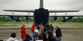 Members of Sandy Lake First Nation in northwestern Ontario have been flown out of the community on Hercules aircraft due to nearby wildfire Red Lake 12. (Photo: Nicholas Zahari / Department of National Defence)