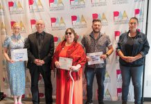 The recipients of the Peterborough Arts Awards on June 12, 2025 at the Canadian Canoe Museum: Rebecca Birrell for her father Syd Birrell (Outstanding Senior Artist), David Goyette (Arts Champion), Lynda Todd (Outstanding Emerging Artist), Chad Hogan (Arts Catalyst), and Olivia Whetung (Outstanding Mid-Career Artist). Not pictured is Sarah Decarlo (Outstanding Achievement by an Indigenous Artist). Each award winner received $2,000 and a pin created by local artists Christy Haldane and Valerie Davidson. (Photo courtesy of Electric City Culture Council)