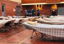 Staff at Trinity Centre in Peterborough preparing to open its overnight drop-in program. (Photo: Trinity Centre 2024-25 annual report)
