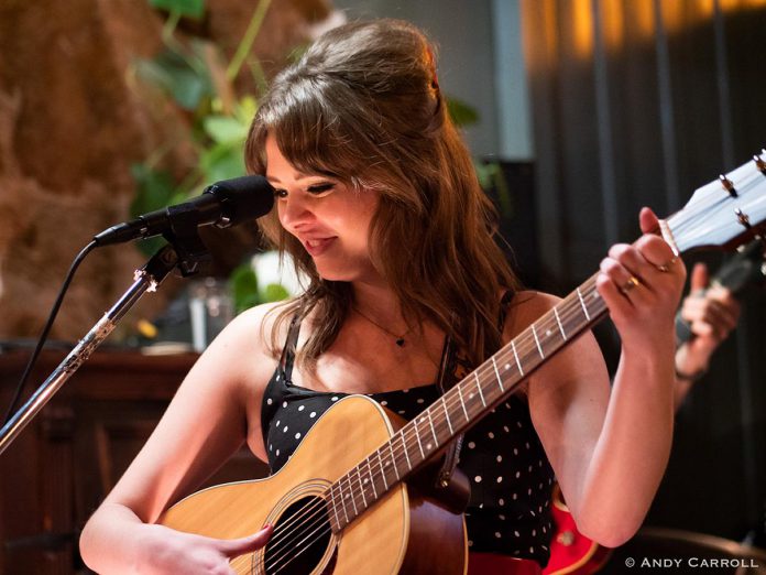 The Peterborough Folk Festival's 2025 Emerging Artist Award winner Jeanne Truax performing at Jethro's Bar + Stage in downtown Peterborough in February 2024. The 22-year-old singer-songwriter, guitarist, and keyboardist released her debut single "I Know What Your Like" in May 2025 with the help of her brother Nathan, who won the Emerging Artist Award in 2022. (Photo: Andy Carroll) The Peterborough Folk Festival's 2025 Emerging Artist Award winner Jeanne Truax performing at Jethro's Bar + Stage in downtown Peterborough in February 2024. The 22-year-old singer-songwriter, guitarist, and keyboardist released her debut single "I Know What Your Like" in May 2025 with the help of her brother Nathan, who won the Emerging Artist Award in 2022. (Photo: Andy Carroll)