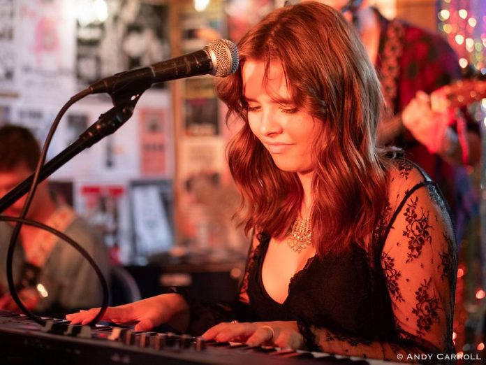 The Peterborough Folk Festival's 2025 Emerging Artist Award winner Jeanne Truax performing at the Pig's Ear Tavern in downtown Peterborough in August 2024. As the festival's Emerging Artist, Truax will perform at the festival's kick-off concert on August 14 and will attend the annual Folk Music Ontario conference this fall in Ottawa. (Photo: Andy Carroll)