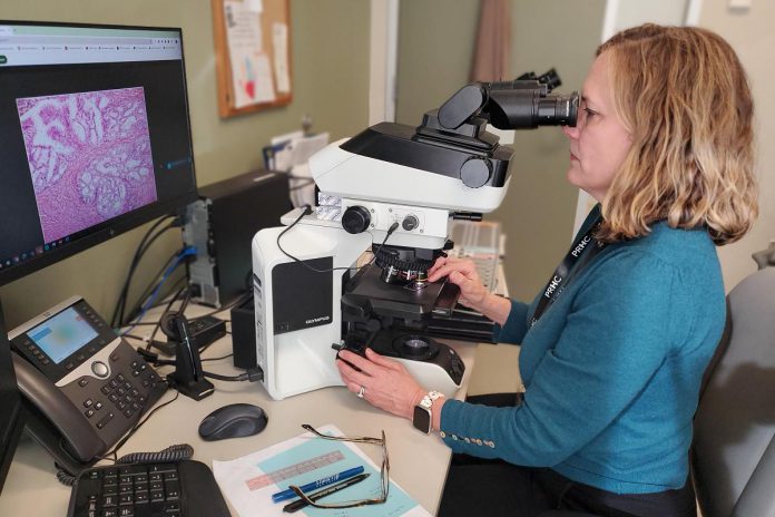Dr. Katie O'Reilly, pathologist and medical director of laboratory medicine at Peterborough Regional Health Centre (PRHC), examines a tissue sample. The PRHC Foundation has made it a priority to invest in the future of cancer care by bringing digital pathology to the regional hospital, with the help of donors. An area of focus for the Foundation's $60 million Campaign for PRHC, the state-of-the-art technology will produce efficient and more accurate diagnoses, reduce turnaround time, and empower world-class healthcare close to home. (Photo courtesy of PRHC Foundation) Dr. Katie O'Reilly, pathologist and medical director of laboratory medicine at Peterborough Regional Health Centre (PRHC), examines a tissue sample. The PRHC Foundation has made it a priority to invest in the future of cancer care by bringing digital pathology to the regional hospital, with the help of donors. An area of focus for the Foundation's $60 million Campaign for PRHC, the state-of-the-art technology will produce efficient and more accurate diagnoses, reduce turnaround time, and empower world-class healthcare close to home. (Photo courtesy of PRHC Foundation)