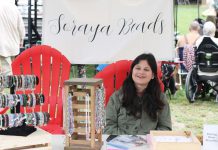 19-year-old Curve Lake First Nation artist Soraya Whetung of Soraya Beads selling her handmade jewellery at the 71st annual Curve Lake Pow Wow in September 2024. Her handmade beaded bracelets will soon be available for purchase through Canadian off-price department store chain Winners. (Photo courtesy of Soraya Whetung)