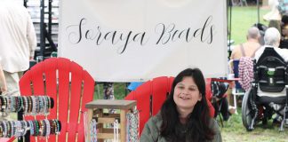 19-year-old Curve Lake First Nation artist Soraya Whetung of Soraya Beads selling her handmade jewellery at the 71st annual Curve Lake Pow Wow in September 2024. Her handmade beaded bracelets will soon be available for purchase through Canadian off-price department store chain Winners. (Photo courtesy of Soraya Whetung)