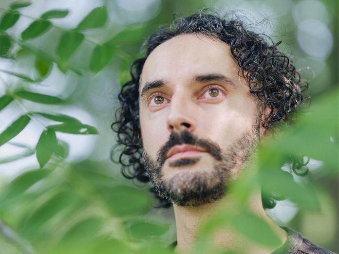 Ottawa-based musician, spoken word poet, and arts educator Nathanael Larochette will be joining Ziysah von Bieberstein at the launch party for Ziysah's new collection of works, "At the Risk of Listening," at Peterborough's Take Cover Books on June 13 and 14, 2025. The evening will see a combination of poetry and music performed by the two artists. (Photo: Curtis Perry)