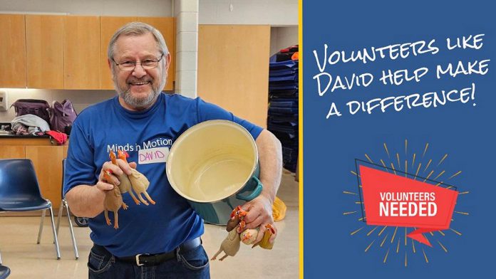 The Alzheimer Society of Peterborough, Kawartha Lakes, Northumberland, and Haliburton's Minds in Motion program is a community-based social program that incorporates physical activity and mental stimulation for people with early to mid-stage signs of dementia and their care partners. Volunteers like David get involved in the exercises, serve refreshments, and participate in cognitive activities. (Photo courtesy of Alzheimer Society PKLNH)