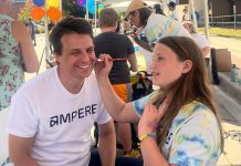 Ampere CEO and founder Ryan Oliver having his face painted on August 29, 2024 in Lindsay during the educational organization's Level-Up Summer Street Festival, which also celebrated the opening of its Makerspace & Learning Centre on Peel Street. For 2025, Ampere is hosting STEAM Fest on Saturday, August 16, offering for people of all ages a chance to explore science, technology, engineering, arts, and math (STEAM) with STEAM-based activities, live music from local artists, Indigenous storytelling, giveaways, interactive games, access to a sensory safe space, and more. (Photo: Ampere)