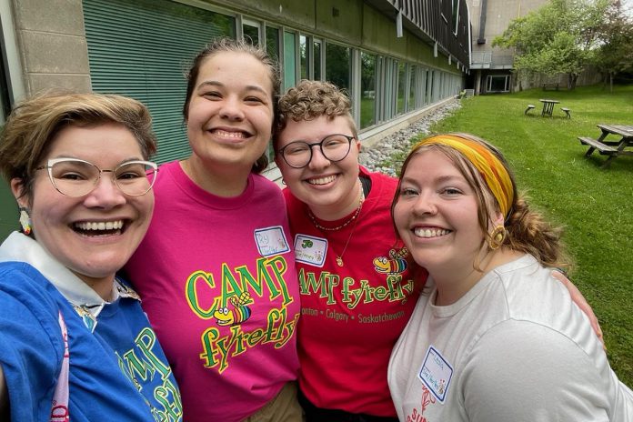 Camp fYrefly faculty liaison Dr. Rachael Nicholls (left) with 2025 camp coordinators Reilly Lafreniere and Jo Currie and Trent University student Leola Banks, who is completing her alternative setting placement at the camp. The group recently hosted Camp fYrefly's first GSA (Gay-Straight Alliance) Conference, inviting local high school students to connect on campus for keynotes, workshops, and activities. (Photo: Dr. Rachael Nicholls)