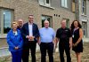 Officials from the Ontario government and the City of Kawartha Lakes gathered at a housing development in Fenelon Falls as part of an announcement of $1,442,307 in funding for the municipality through the province's "Building Faster Fund" after the municipality broke ground on 451 new homes last year, representing 83 per cent of its 2024 housing target. From left to right: Haliburton-Kawartha Lakes-Brock MPP Laurie Scott, Kawartha Lakes councillor Mike Perry, Municipal Affairs and Housing Minister parliamentary assistant Matthew Rae, Kawartha Lakes mayor Doug Elmslie, Kawartha Lakes building and property housing manager Don Quibell, and Kawartha Lakes human services director Cheryl Faber. (Photo: City of Kawartha Lakes)