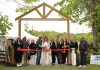 Samantha Perry cut the ribbon alongside her parents Mike and Linda Belsey at a ceremony on May 30, 2025 to celebrate the start of the first full season of Pondview Estates. In partnership with Perry's business Samantha Ann & Co., the elevated do-it-yourself wedding venue in the Township of Asphodel-Norwood makes it a priority to work with other local wedding vendors, who they also celebrate through social media promotion and by hosting an annual open house and vendor market. (Photo: Shannon FC Photography)
