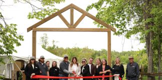 Samantha Perry cut the ribbon alongside her parents Mike and Linda Belsey at a ceremony on May 30, 2025 to celebrate the start of the first full season of Pondview Estates. In partnership with Perry's business Samantha Ann & Co., the elevated do-it-yourself wedding venue in the Township of Asphodel-Norwood makes it a priority to work with other local wedding vendors, who they also celebrate through social media promotion and by hosting an annual open house and vendor market. (Photo: Shannon FC Photography)
