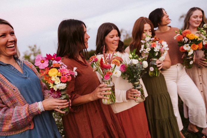 In addition to supplying pre-cut bouquets for brides and selling through wholesalers, Sanctuary Flower Fields allows guests to pick their own jars full of flowers beginning in August. The farm will also be hosting several special events which will feature local wellness practitioners, including a Sanctuary Summer Soiree and the Rising Wildflowers Mini Wellness Retreat. (Photo: Mary Zita Payne Photography)