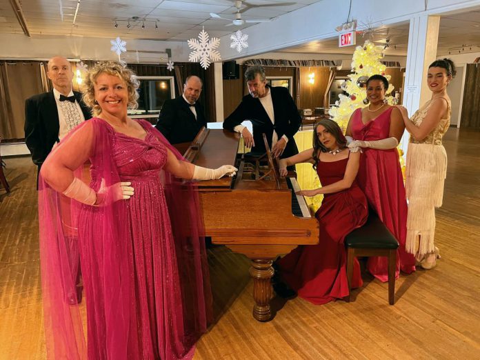 "Murder at the Blue Moon Saloon" continues Globus Theatre's tradition of staging annual murder mysteries over the past 20 years, originally in advance of the Christmas holidays (such as 2024's "Murder at the Snowball Ball", pictured) and then expanding with an additional summer show in recent years, with each show being an immersive experience that's so much more than just a play. (Photo courtesy of Globus Theatre)