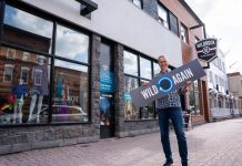 Rob Arkell, mission leader of Wild Rock Outfitters' initiative, stands outside the downtown Peterborough outdoor retailer to promote the trade-in and resale program. A business member of GreenUP's Green Economy Peterborough, Wild Rock is embracing the concept of a circular economy. (Photo: Jeff Faulds / Wild Rock Outfitters)