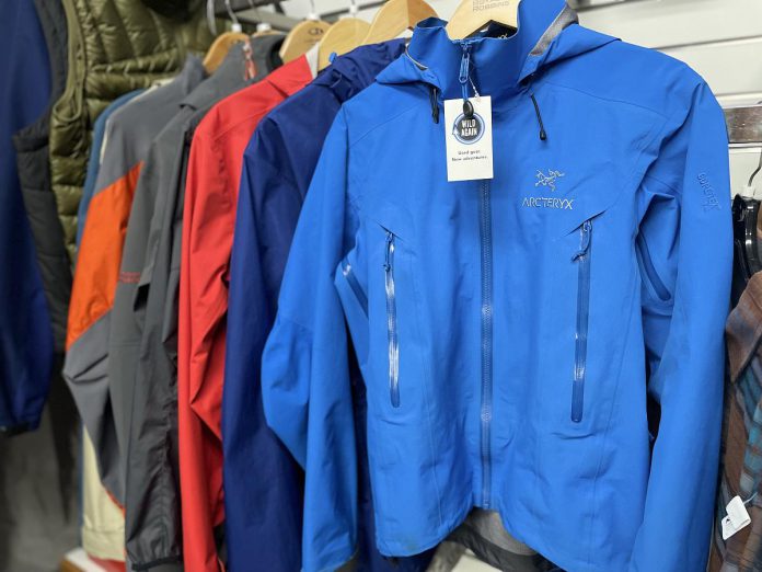 Wild Rock Outfitters' Wild Again initiative aims to keep high-quality outdoor products in circulation, such as these jackets available in the basement of the downtown Peterborough outdoor retailer. By reselling products, businesses can not only keep textiles out of landfills but also profit from selling the same item multiple times, and consumers benefit by getting a high-quality product at a lower price. (Photo: Jeff Faulds / Wild Rock Outfitters)