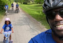 Trent Health in Motion co-owners Michael Williams and Reanna Montopoli cycling with their family and colleagues during a cycling event in June. The Peterborough health and wellness clinic has sponsored the GreenUP 2025 Summer Ride Club's grand prize with a $500 gift card to any local bike shop. (Photo: Micheal Williams / Trent Health in Motion)