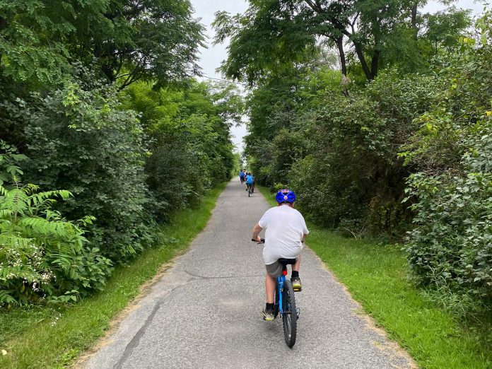 Peterborough has many wonderful places to bike, including over 26 kilometres of urban trails such as the Rotary Greenway Trail. Summer Ride Club invites participants to bike further and more often in the summer, including trying new routes and trails. (Photo: Natalie Stephenson / GreenUP)