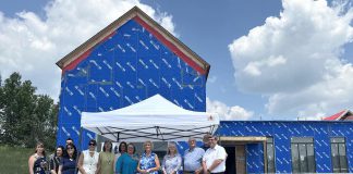Provincial and municipal politicians and healthcare representatives gathered at the Summit Wellness Centre under construction in Coboconk on July 15, 2025 for an announcement of $3,493,400 in funding from the Ontario government to the Kawartha Lakes Haliburton Ontario Health Team for the Kawartha North Family Health Team to expand interprofessional primary care teams to Coboconk, Woodville, and Minden so that up to 6,902 people have access to primary healthcare. (Photo: City of Kawartha Lakes)
