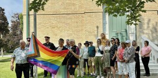 Kawartha Lakes Mayor Doug Elmslie (far left) participates in the raising of the Pride flag at Kawartha Lakes City Hall in Lindsay on July 8, 2024. Kawartha Lakes Pride kicks off its 10th anniversary Pride Week in 2025 with a flag-raising ceremony on Monday, July 7 at 10 a.m., with the week's celebrations concluding on Saturday in Lindsay with Pride in the Park in Victoria Park followed by a Pride After Dark party at The Wings World. (Photo: Kawartha Lakes Pride)