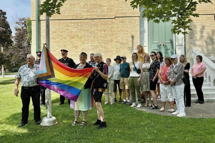 Kawartha Lakes Mayor Doug Elmslie (far left) participates in the raising of the Pride flag at Kawartha Lakes City Hall in Lindsay on July 8, 2024. Kawartha Lakes Pride kicks off its 10th anniversary Pride Week in 2025 with a flag-raising ceremony on Monday, July 7 at 10 a.m., with the week's celebrations concluding on Saturday in Lindsay with Pride in the Park in Victoria Park followed by a Pride After Dark party at The Wings World. (Photo: Kawartha Lakes Pride) Kawartha Lakes Mayor Doug Elmslie (far left) participates in the raising of the Pride flag at Kawartha Lakes City Hall in Lindsay on July 8, 2024. Kawartha Lakes Pride kicks off its 10th anniversary Pride Week in 2025 with a flag-raising ceremony on Monday, July 7 at 10 a.m., with the week's celebrations concluding on Saturday in Lindsay with Pride in the Park in Victoria Park followed by a Pride After Dark party at The Wings World. (Photo: Kawartha Lakes Pride)