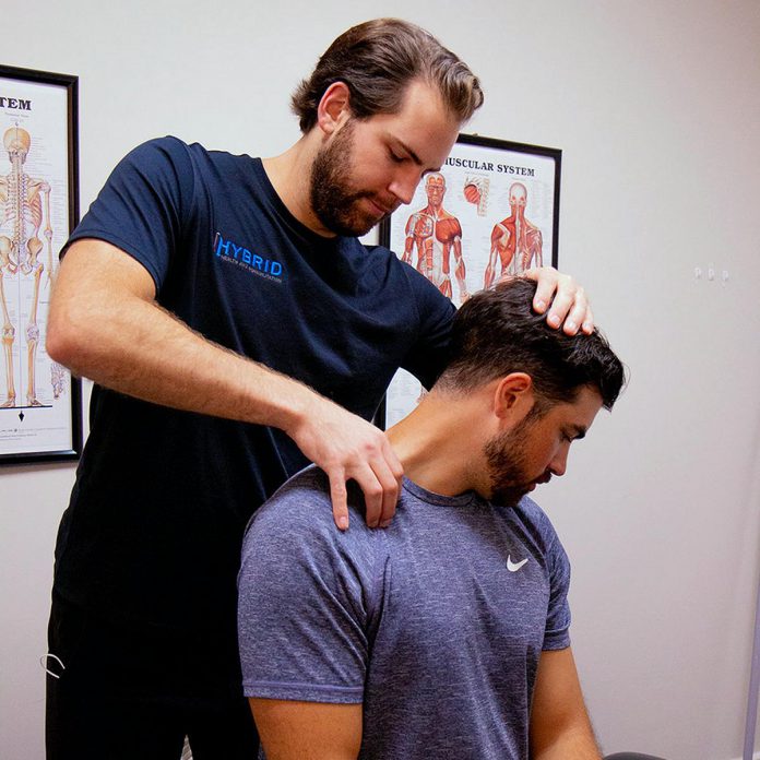Hybrid Health and Rehabilitation is an independent business working out of Hybrid Fitness at 822 Rye Street in Peterborough. Owned by husband-and-wife chiropractors Dr. Shayla Conrad and Dr. Dan Calow, the clinic treats back and neck pain, concussion and vertigo, rotator cuff injuries, arthritis, muscle strains, sports injuries, and more. Having a variety of specialized practitioners including chiropractors and a physiotherapist and a massage therapist within one clinic means clients receive collaborative care and individualized treatment plans. (Photo courtesy of Hybrid Health and Rehabilitation)