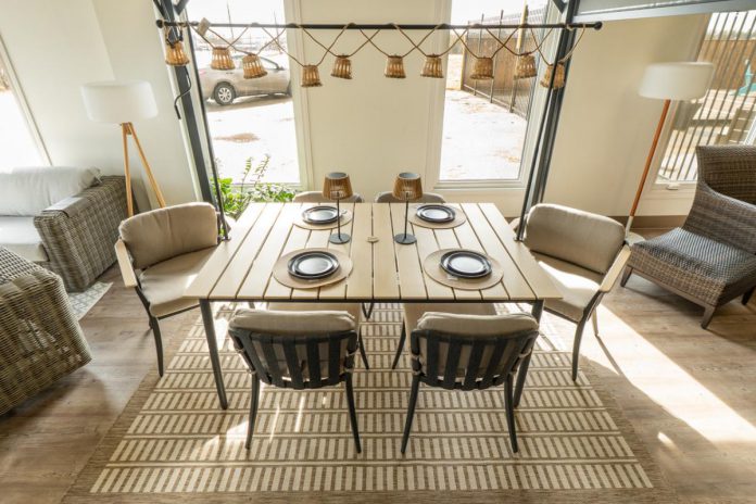 A versatile, transitional design from Gensun, the Strata table features a sleek slat top with round legs that pair with the soft, modern detailing of the Jayne arm and side chairs. Gensun is one of the high-quality brands known around the world that will be on sale during the Warehouse Clearance Sale at Peterborough's Shop The Lake from August 8 to 10, 2025, with selected items up to 75 per cent off. (Photo: Shop The Lake)