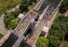 An aerial view of paddlers packed into the two tubs of the Peterborough Lift Lock for the seventh annual Lock & Paddle event on July 19, 2025. (Photo: Parks Canada)